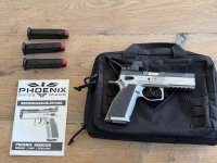 Phoenix Redback 9mm incl Trijicon SRO topwapen in nieuwstaat.