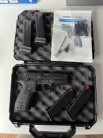 Steyr ATD optics ready met Hogue holster