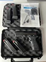 Steyr ATD optics ready met Hogue holster
